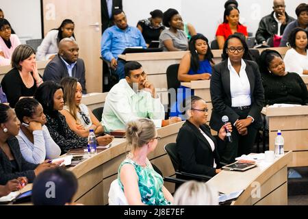 Johannesburg, South Africa - November 20, 2014: Diverse students attending a lecture in College Auditorium Stock Photo