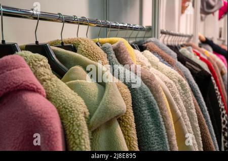 Collection of trendy coats and jackets made of faux fur Stock Photo