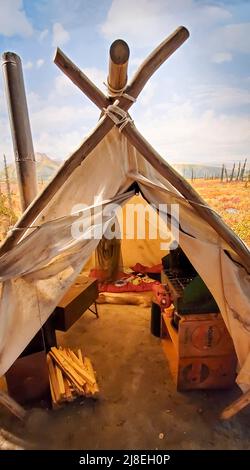 Depiction of hunter’s tent in Alaska at the Morris Thompson Cultural & Visitors Center in Fairbanks, AK. Stock Photo