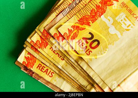 several Brazilian real notes - twenty banknote in the foreground Stock ...