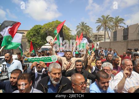 Gaza. 15th May, 2022. Palestinian people attend a demonstration marking the 74th anniversary of Nakba Day in Gaza City, on May 15, 2022. Credit: Rizek Abdeljawad/Xinhua/Alamy Live News Stock Photo