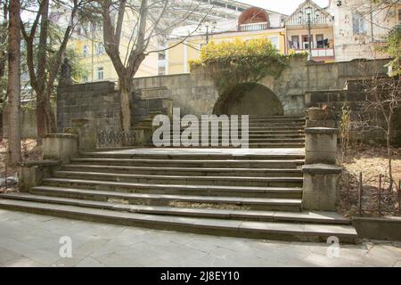 Old stairs to house. Staircase is made of stone. Details of old architecture. Stock Photo