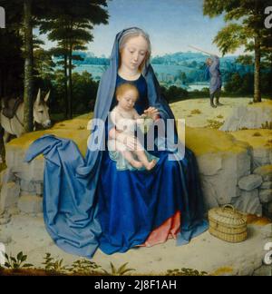 The Rest on the Flight into Egypt painted by Gerard David. In the background Joseph is beating chestnuts from a tree. Stock Photo