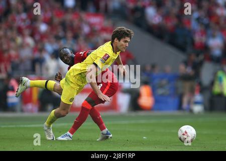 London, UK. 14th May, 2022. Marcos Alonso of Chelsea is fouled by Naby Keita of Liverpool. The Emirates FA Cup Final, Chelsea v Liverpool at Wembley Stadium in London on Saturday 14th May 2022.this image may only be used for Editorial purposes. Editorial use only, license required for commercial use. No use in betting, games or a single club/league/player publications.pic by Andrew Orchard/Andrew Orchard sports photography/Alamy Live News Credit: Andrew Orchard sports photography/Alamy Live News Stock Photo