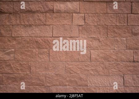 Background of old vintage clay tan brick wall Stock Photo