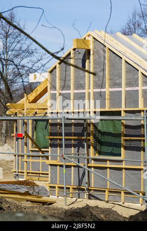 Single Family Home Construction. Interior frame of new wooden house under construction. Stock Photo