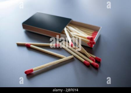 wooden matches for lighting in a cardboard sliding box Stock Photo