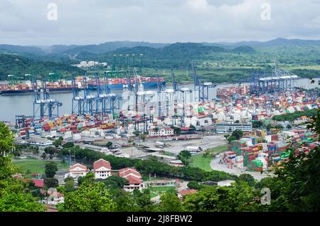 Panama Ports Company containers and Panama Canal Pacific Entrance as seen in the distance from the Ancon Hill Stock Photo