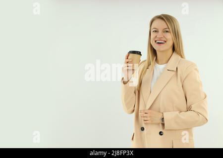 Young and attractive business woman on light background Stock Photo
