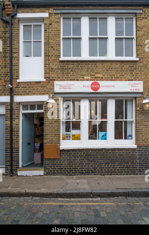 Play Vinyl, a record shop specialising in original vinyl records and restored record players. Ezra Street, London E2, England, UK. Stock Photo