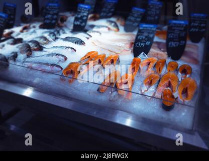 fishmarket ice-shelf with the salmon steaks on foreground Stock Photo