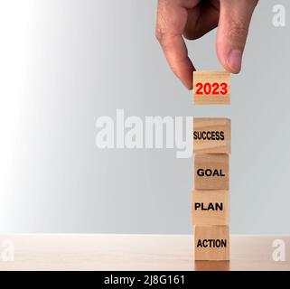 2023 new year strategy business growth concept. 2023 new year growth concept with action, goal, plan and success. Stock Photo