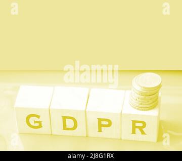 GDPR abbreviation Written In Wooden Cubes on red. Information protection concept. Stock Photo