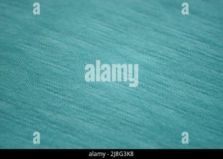 Wrinkled pale blue jersey, soft fabric background. Stock Photo