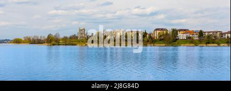 Elk, Poland - May 1, 2022: Panoramic view of Elk town center at Jezioro Elckie lake shore in Masuria region of Poland Stock Photo