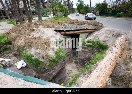 Irpin, Ukraine. 15th May, 2022. A trench near a road. (Photo by Michael Brochstein/Sipa USA) Credit: Sipa USA/Alamy Live News Stock Photo