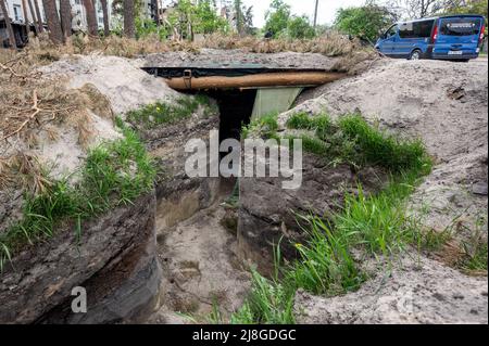 Irpin, Ukraine. 15th May, 2022. A trench near a road. (Photo by Michael Brochstein/Sipa USA) Credit: Sipa USA/Alamy Live News Stock Photo