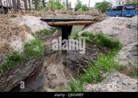 Irpin, Kyiv Oblast, Ukraine. 15th May, 2022. A trench near a road. (Credit Image: © Michael Brochstein/ZUMA Press Wire) Stock Photo
