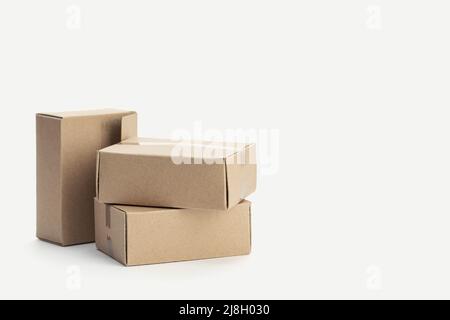 Pile of blank Cardboard boxes isolated on white background. Template Mock up. Copy space Stock Photo