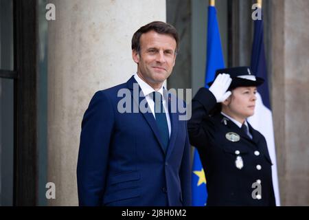 Paris, France. 16th May, 2022. French President Emmanuel Macron waits for European Council President prior to a working lunch at the presidential Elysee Palace in Paris on May 16, 2022. Photo by Raphael Lafargue/ABACAPRESS.COM Credit: Abaca Press/Alamy Live News Stock Photo