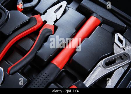 Set of renovation tools. Part of open toolbox with instruments for repair and maintenance Stock Photo