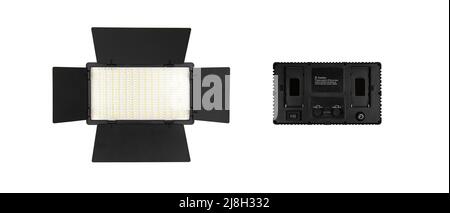 Photo and video lamp isolate on white background. LED lamp with special shutters for the formation of light flux. Photo and video lighting fixture. Stock Photo