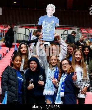 LONDON, ENGLAND - MAY 15: Fans of Chelsea hold up a cardbord cut out of Chelsea Women Millie Bright  before Women's FA Cup Final between Chelsea Women Stock Photo
