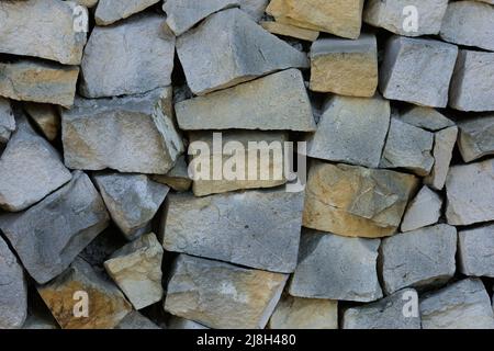 Stone wall background (pieces of limestone) Stock Photo