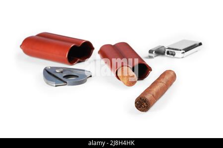 Two cuban cigars isolated on a white background. Leather case, lighter and cutter on table with shadow Stock Photo