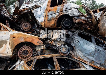 Irpin, Ukraine. 15th May, 2022. View of destroyed cars as a result of Russian shelling in Irpin. Credit: SOPA Images Limited/Alamy Live News Stock Photo
