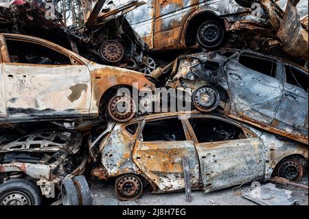 Irpin, Ukraine. 15th May, 2022. View of destroyed cars as a result of Russian shelling in Irpin. Credit: SOPA Images Limited/Alamy Live News Stock Photo