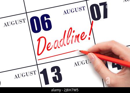 6th day of August. Hand drawing red line and writing the text Deadline on calendar date August 6. Deadline word written on calendar Summer month, day Stock Photo