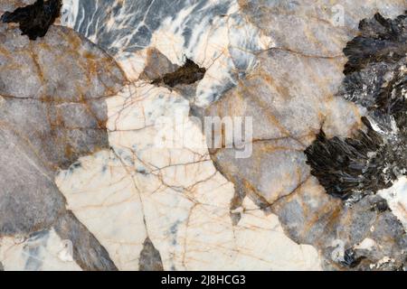 Natural quartzite background in stylish colors for your unique design. Stock Photo