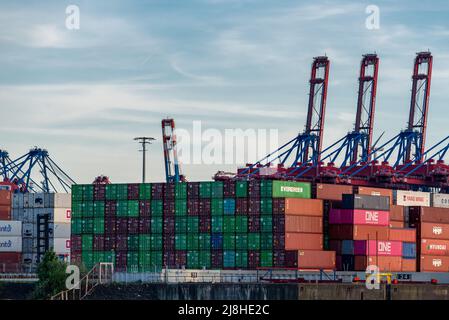 Hamburg, Germany - 05 15 2022: closeup of stacked containers at the container terminal burchardkai in the port of hamburg Stock Photo