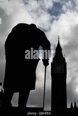 Silhouette Of The Back Of The Bronze Sculpture Statue Of Sir Winston Churchill With Walking Stick Looking Towards The queen Elizabeth Tower And Big Be Stock Photo