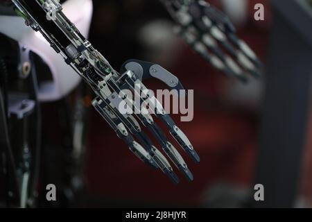 Robot arm and machine learning of contact and consciousness Stock Photo