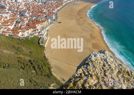 Overview of Nazare Village from the cliffs on Sitio da Nazare, place of the famous legend where the knight Fuas Roupinho was almost falling Stock Photo