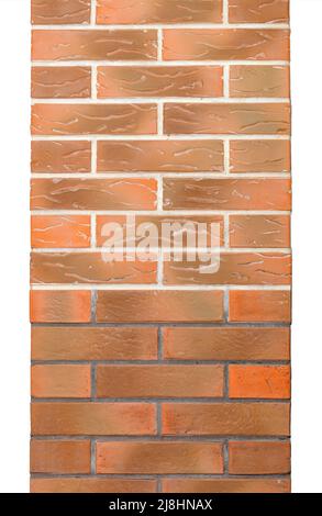 Brick column, brown brick wall texture with smooth gradient, neat even brickwork. Isolated on white background. Vertical image. Stock Photo