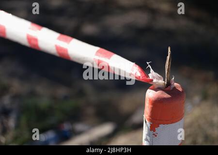 Red and white lines of barrier tape Stock Photo