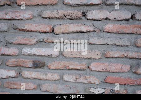 Old red brick wall surface background for home or office design Stock Photo