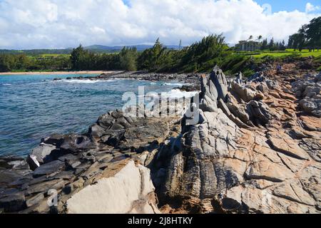 Dragon's Teeth sharp lava rocks on Makaluapuna Point in West Maui, Hawaii - Rock formations due to the fast cooling of the lava flowing into the Pacif Stock Photo