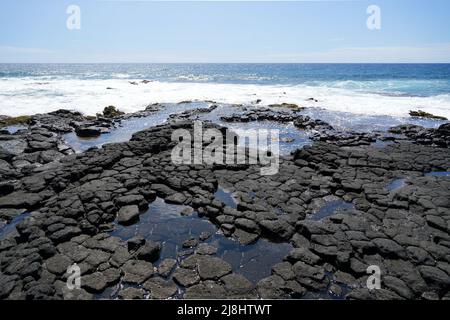 Basaltic prisms in South Point Park, the southernmost point of the United States on the Big Island of Hawaii in the Pacific Ocean Stock Photo