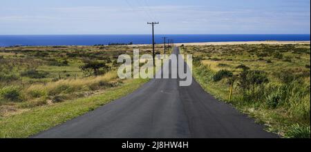 South Point Road leading to the southernmost point of the United States on the Big Island of Hawaii in the Pacific Ocean Stock Photo