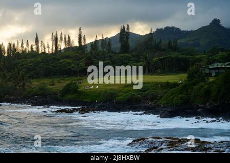 View of the coast of Maui looking south from Kaihalulu Beach on the Road to Hana in Hawaii, United States Stock Photo