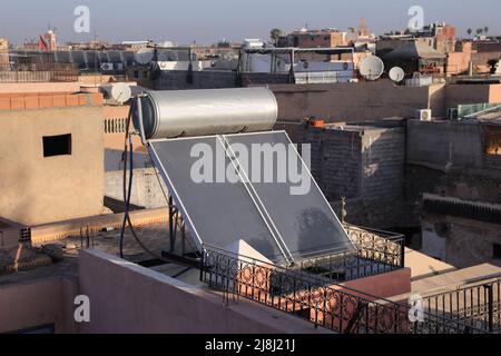 Marrakech city rooftop solar water heater in Morocco. Stock Photo