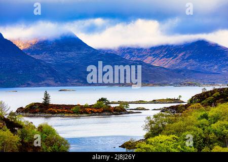 Picturesque Highland village of Plockton,The Jewel of the Highlands, sits on a sheltered bay with stunning views overlooking Loch Carron.  Scotland Stock Photo