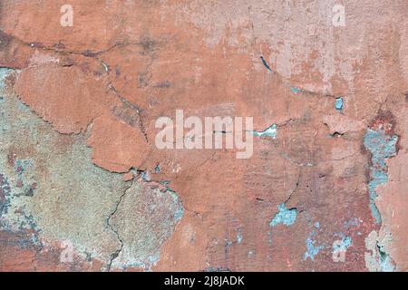 Old wall texture with cracked peeling paint. Abstract grunge backdrop Stock Photo