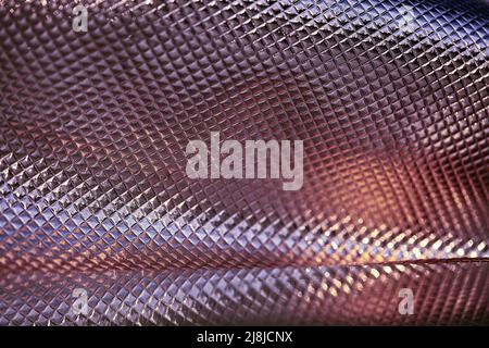 Abstract blurred background with pink foil. Pink blurred texture. Stock Photo