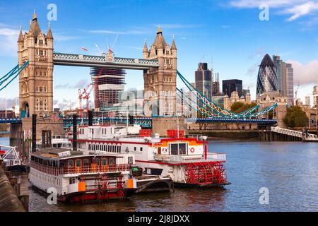 London, UK - Nov 1, 2012: The Dixie Queen replica paddle steamer moored on the River Thames next to the Tower Bridge Stock Photo