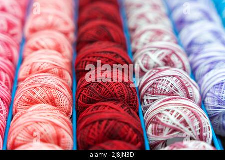 coils of multicolored woolen threads. background. knitting, needlework Stock Photo
